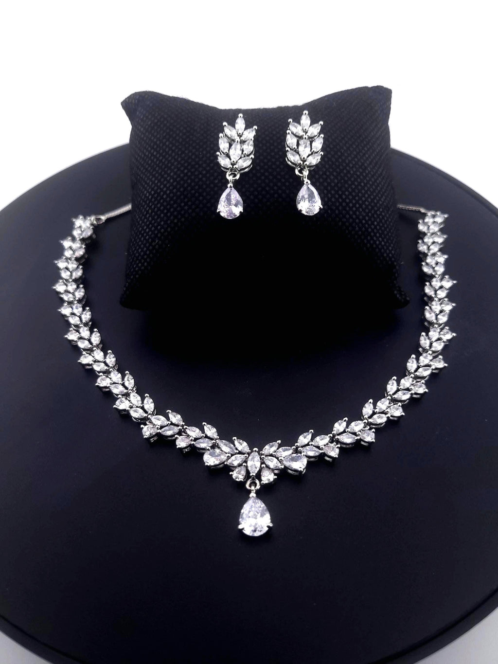 Clean silver plated geometric teardrop crystal accessory matrix map