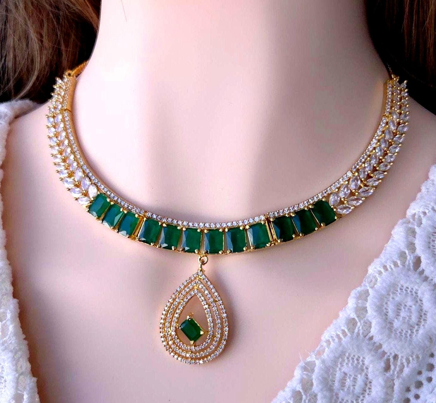 Traditional gold overlay deep green luxury bridal jewelry package view