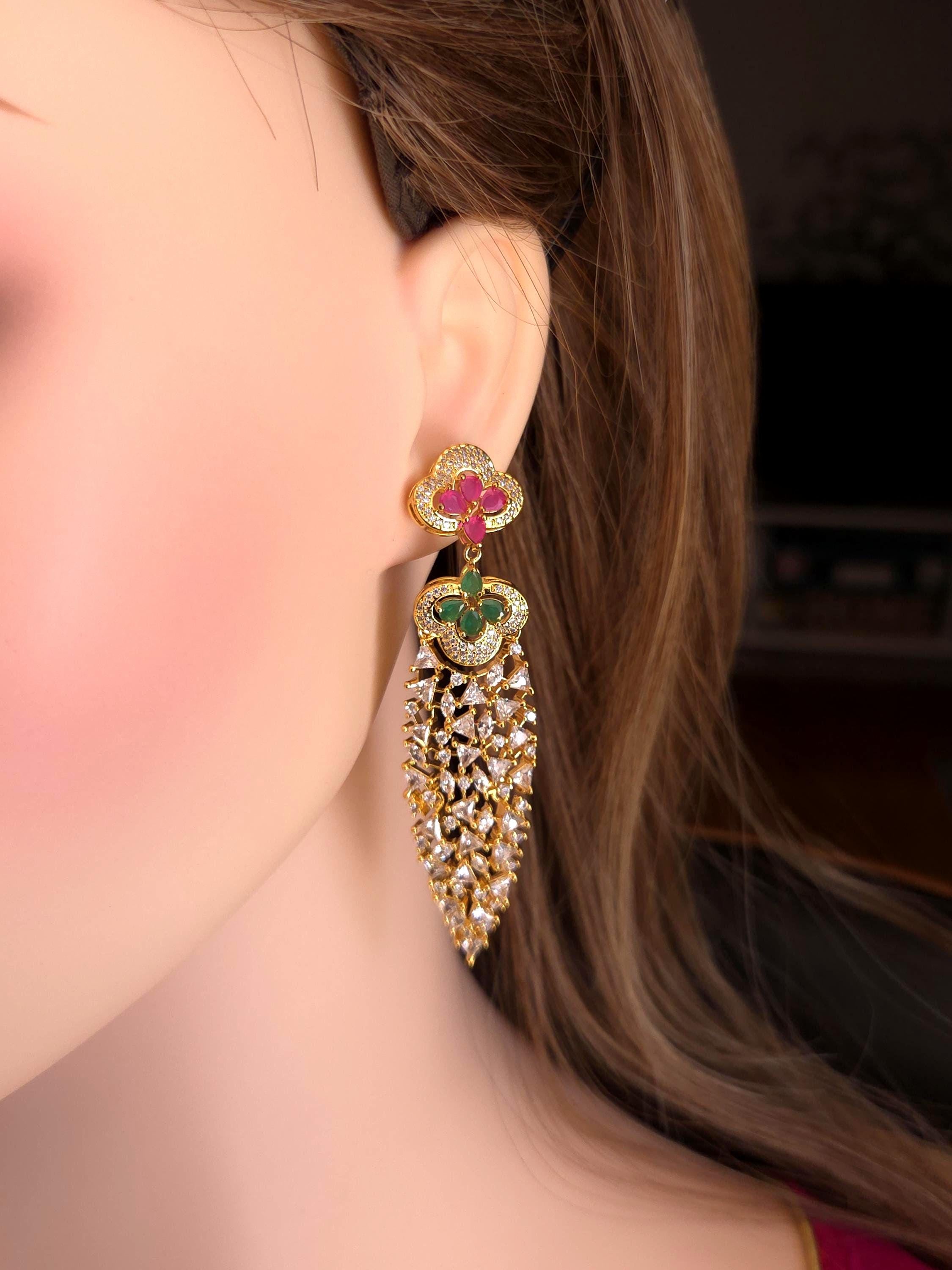 Traditional pink accent kundan style gold frame hanging bridal gems grid