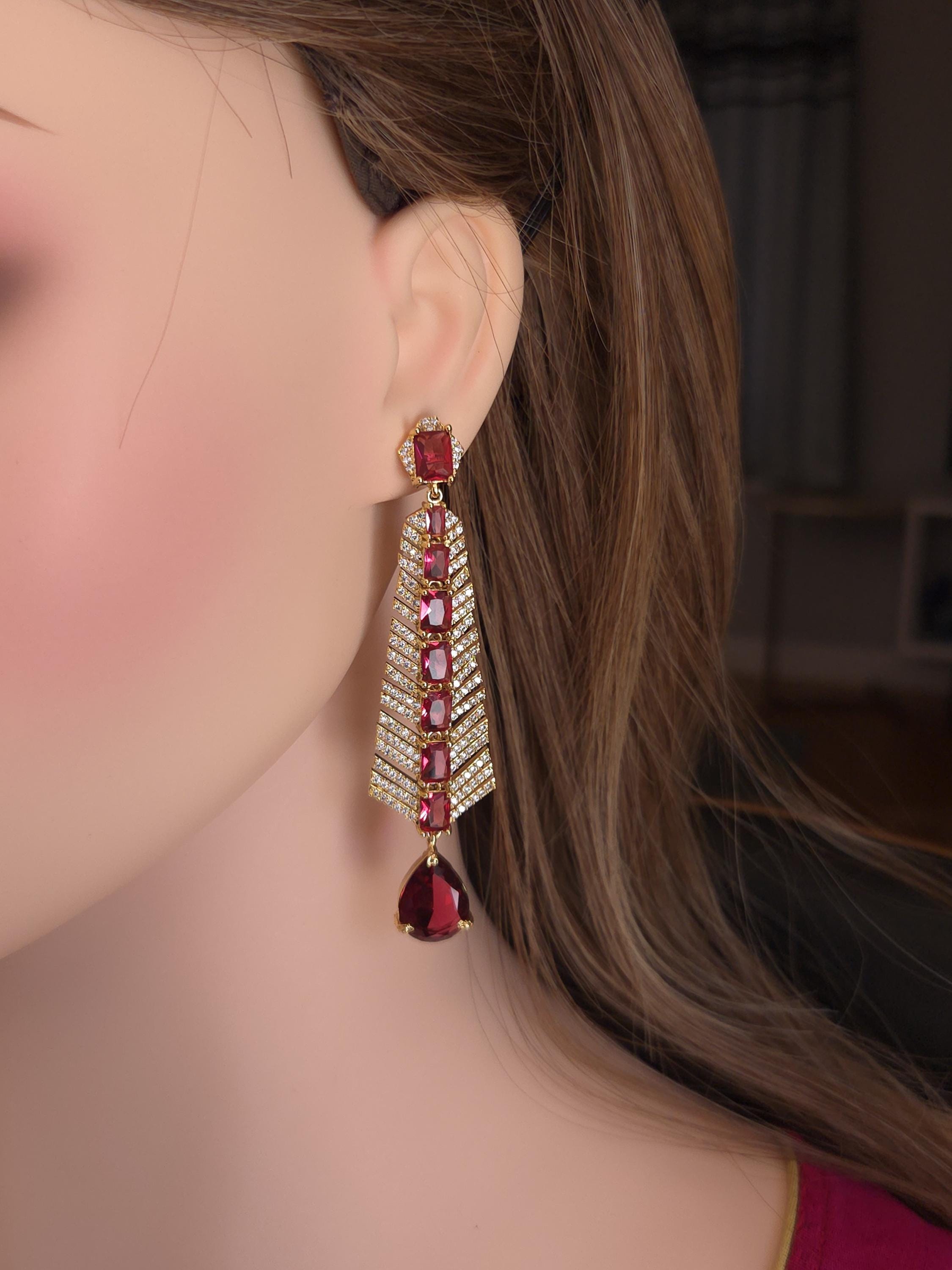 Fine gold finish crimson ruby replica hanging studs with micro zircon borders