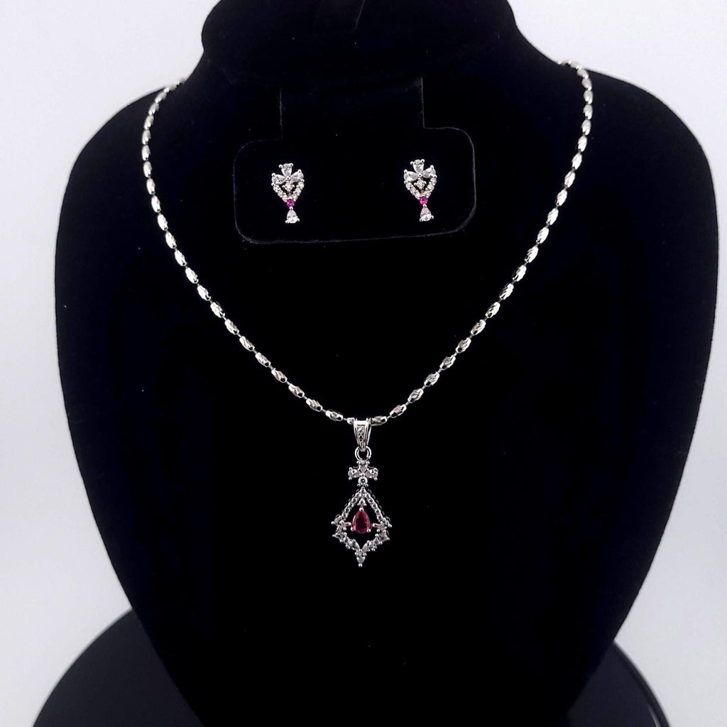 Sleek minimal execution red and blue stone geometric clear pendants
