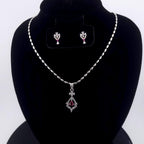Sleek minimal execution red and blue stone geometric clear pendants
