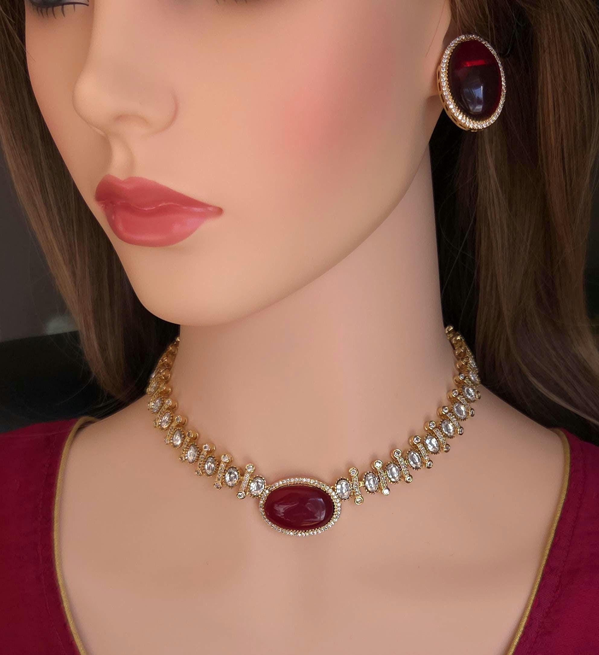 Polished gold backing ruby red crystal choker block model view