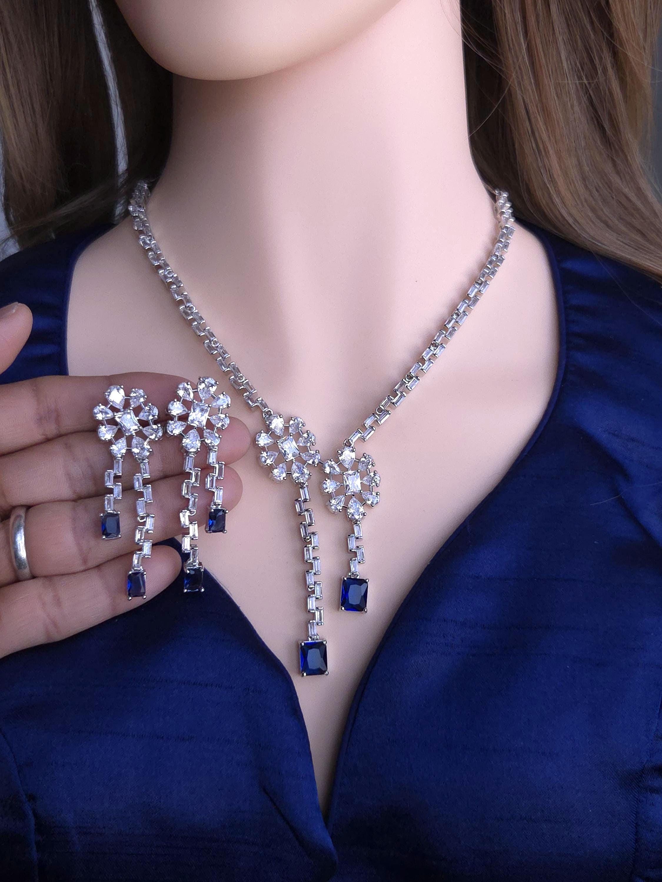 Classic blue sapphire replication drop stone clean wedding loop set indexing