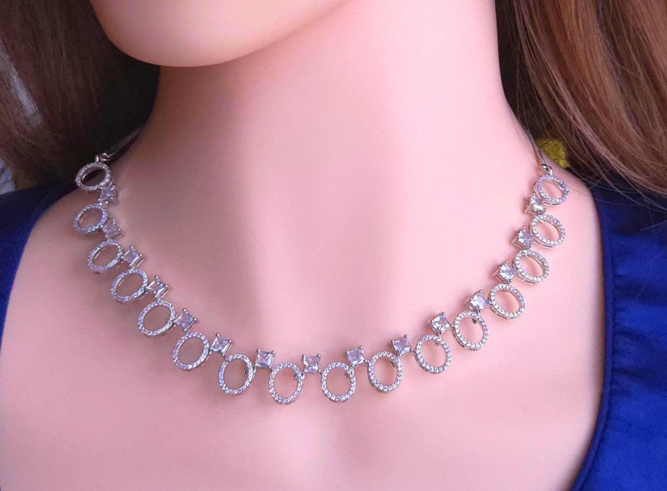 Interlinked oval chain sequence silver design with baguette cuts model