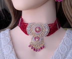 Traditional pink bead strings mixed with shining American Diamond choker layout