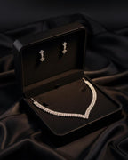 Full view of silver CZ necklace and earrings set on display – wedding jewelry