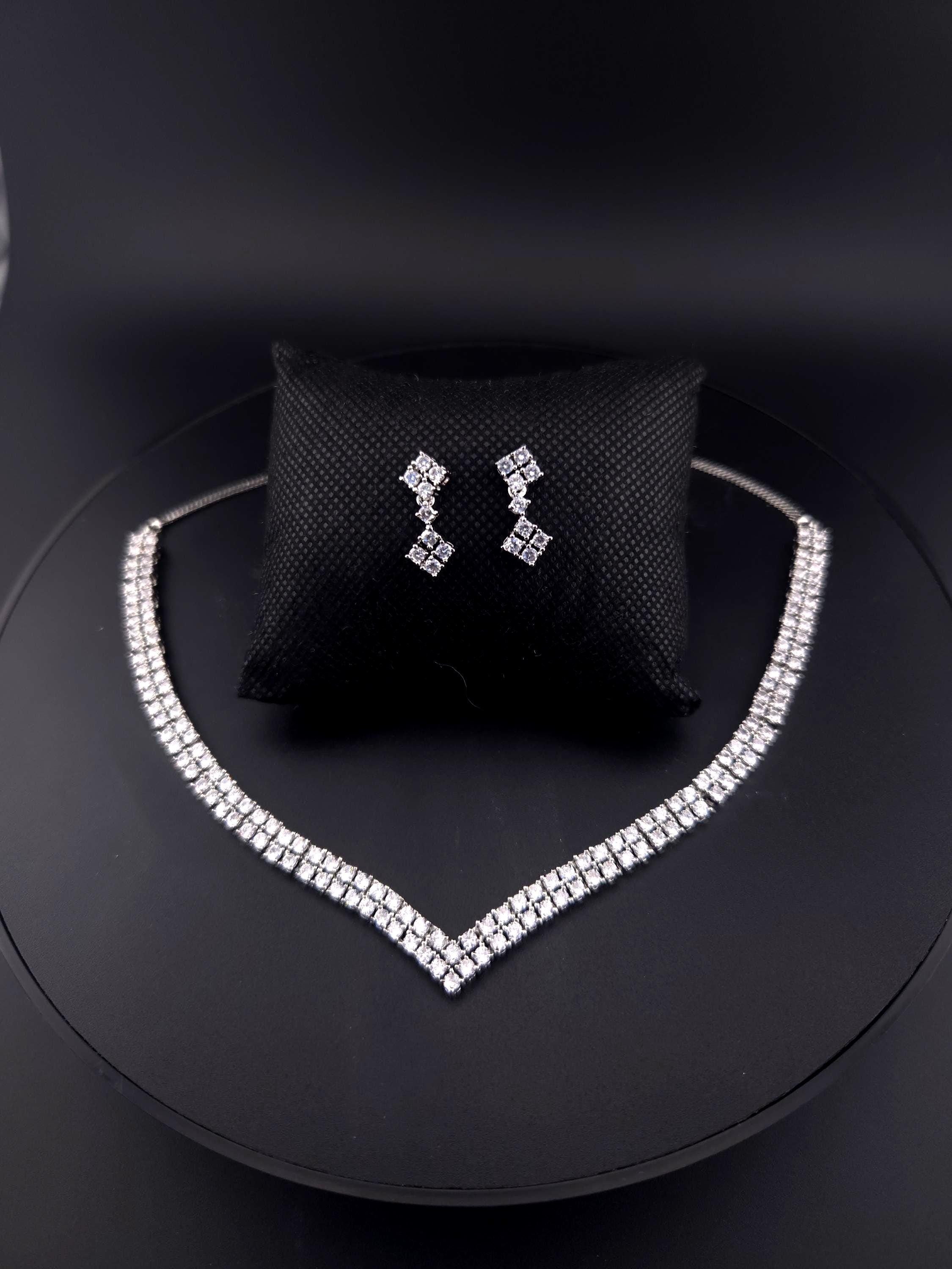 Elegant CZ drop earrings from silver necklace set – bridal jewelry by Zirca Luxe Jewels