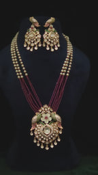 Tota-e-Ishq Polki-style parrot pendant necklace with ruby bead strands and pearl drops, worn with matching parrot earrings – Mithudi by Zirca Luxe