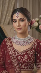 Ruby CZ Multi-Row Bib Choker, Marquise Drop Earring & Maang Tikka Bridal Set Laali – wide graduated ruby oval CZ bib choker with marquise petal fringe border, open-lattice marquise drop earrings with ruby teardrop drops, and open-work marquise maang tikka in silver finish
