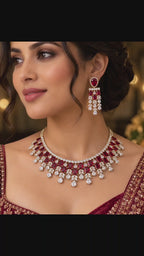 Video showcasing the gold-plated ruby CZ bridal choker and chandelier earring set