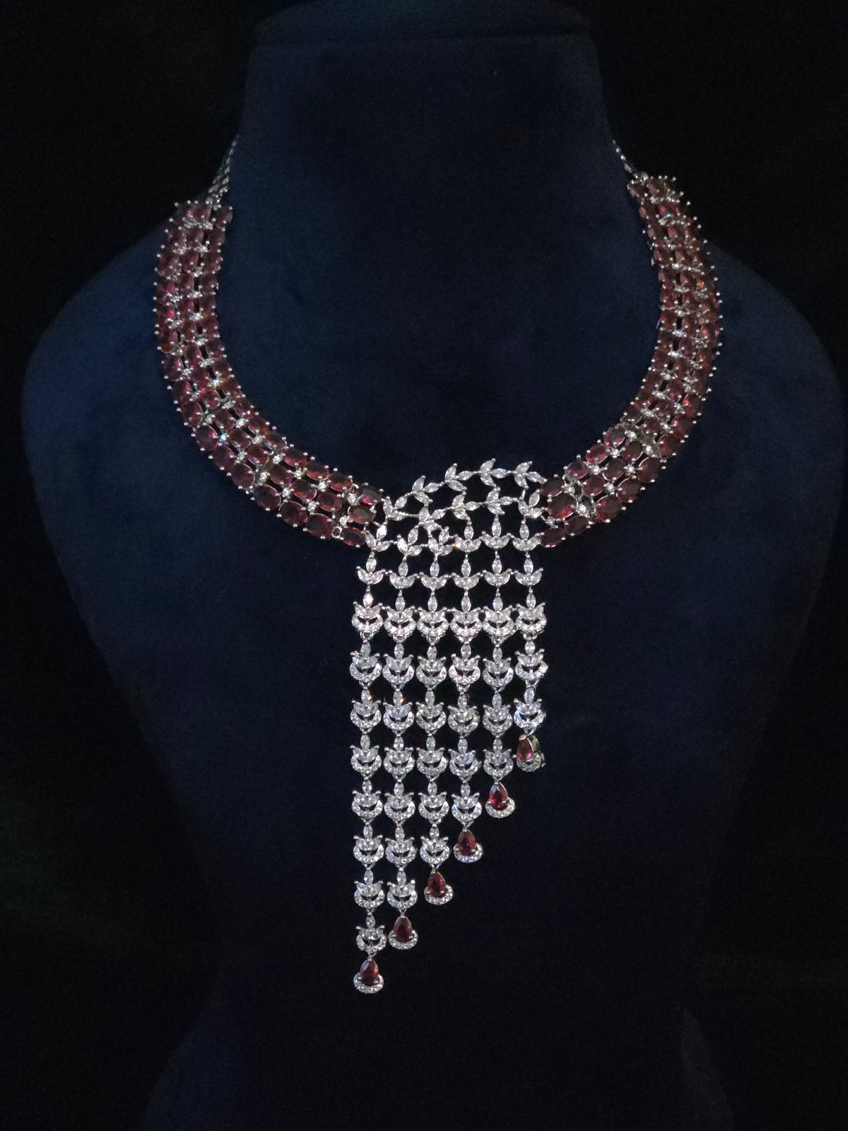 Side or styling view of the Riva statement necklace and matching earrings