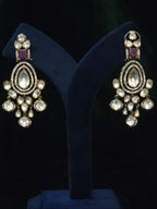 Pair of pear and rose-cut CZ chandelier earrings with ruby accent
